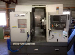 Used 4 axis Okuma LB 300 cnc lathe