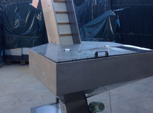 Cleated elevator feeder used