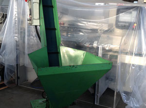 Cleated elevator for caps and bottles used