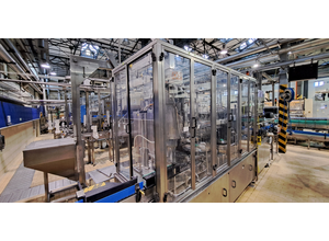 Filling and packing line for glass bottles