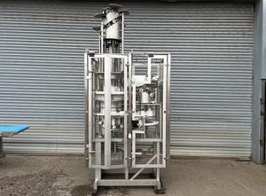 Used Carruthers Six-pak six station volumetric filler