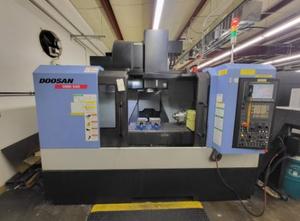 DOOSAN DNM 500 CNC VMC 4 ΑΞΌΝΩΝ ΜΕ ΠΕΡΙΣΤΡΟΦΙΚΌ ΔΕΊΚΤΗ 12" NIKKEN