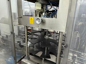 Breitner VS5014 capping machine with Hopman cap supply system